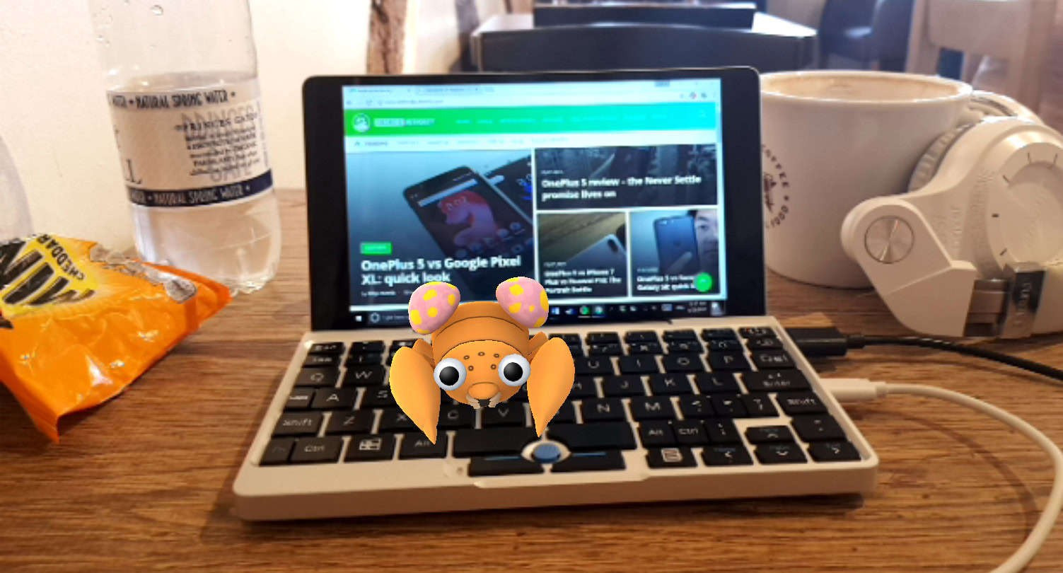 Pokemon GO Photo of an augmenter reality pokemon go character resitng on a notebook.
