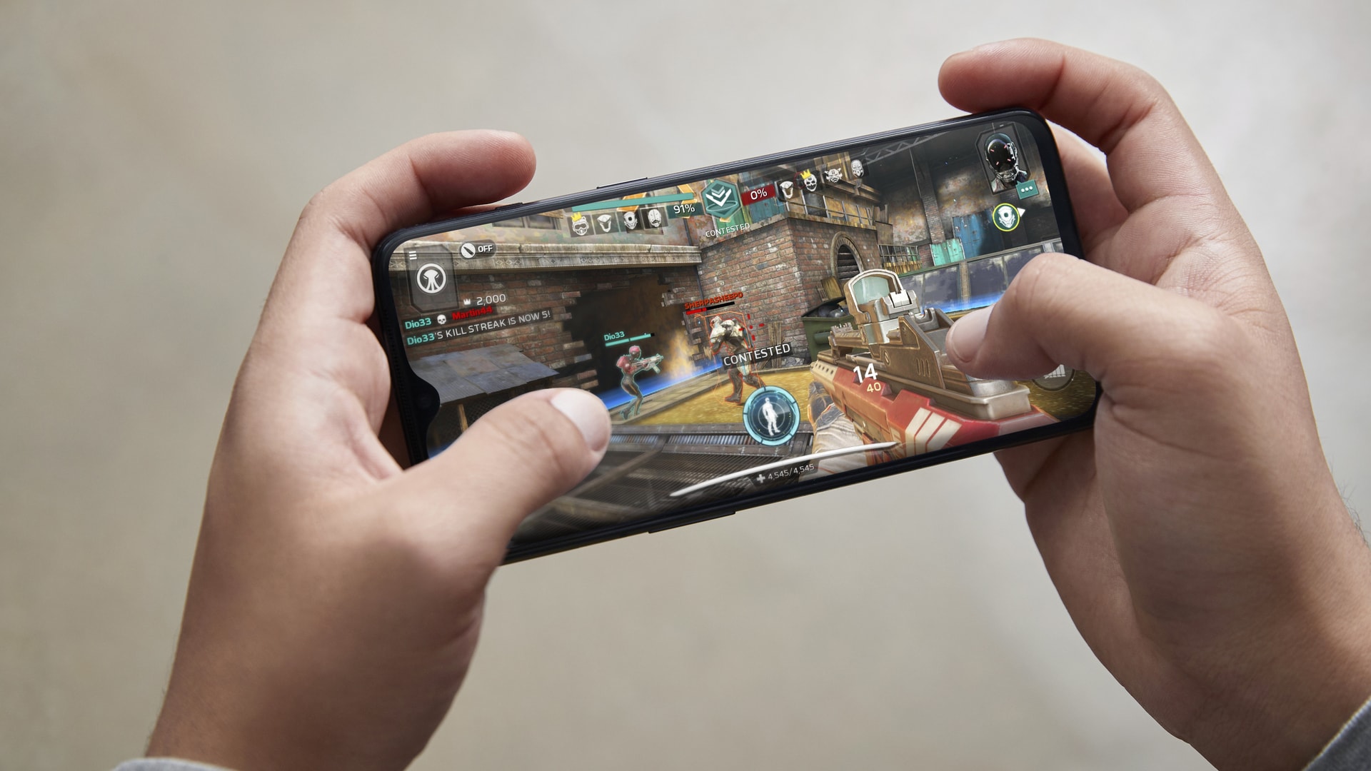 oneplus 7 mirror gray in hand gaming product shot oneplus 7 gaming playing game product shot