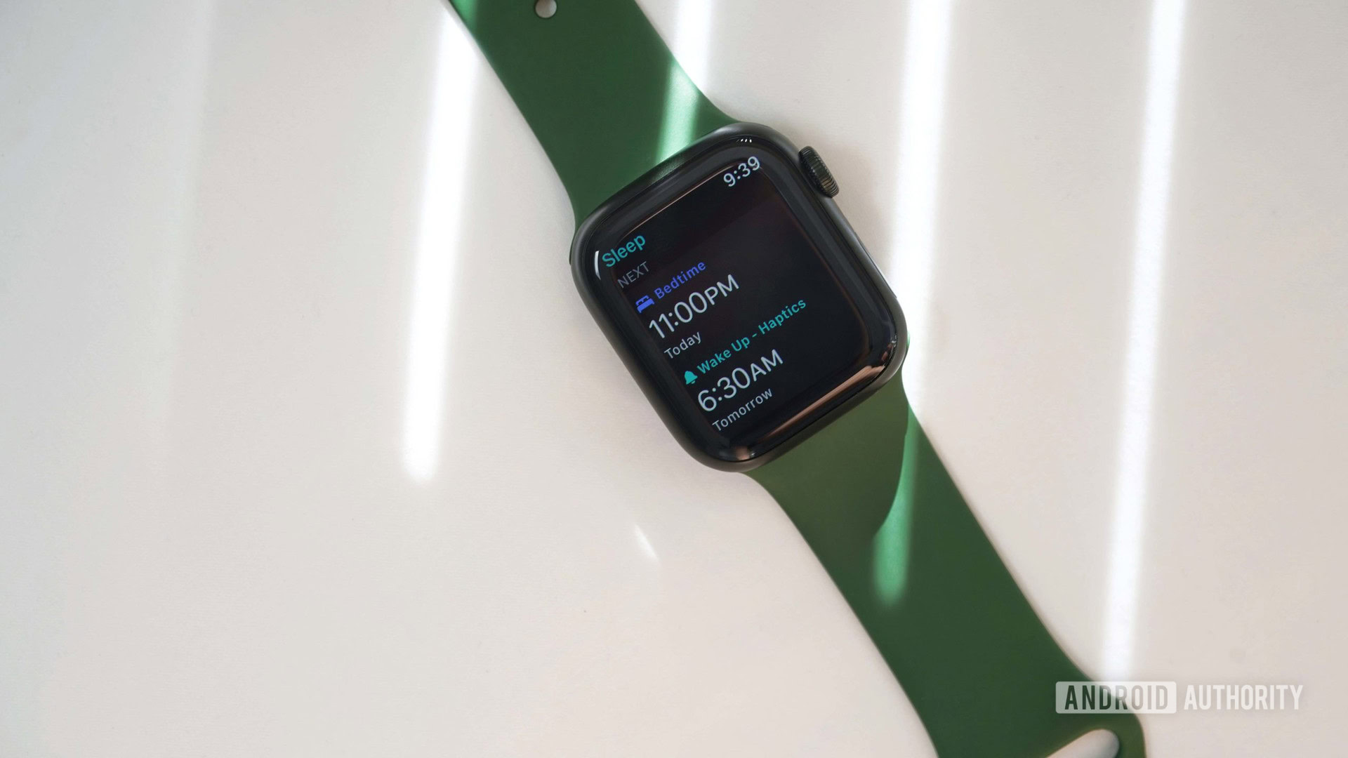 Apple Watch Series 7 Sleep Schedule An Apple Watch Series 7 rests on a white pillow and displays a user's sleep schedule.