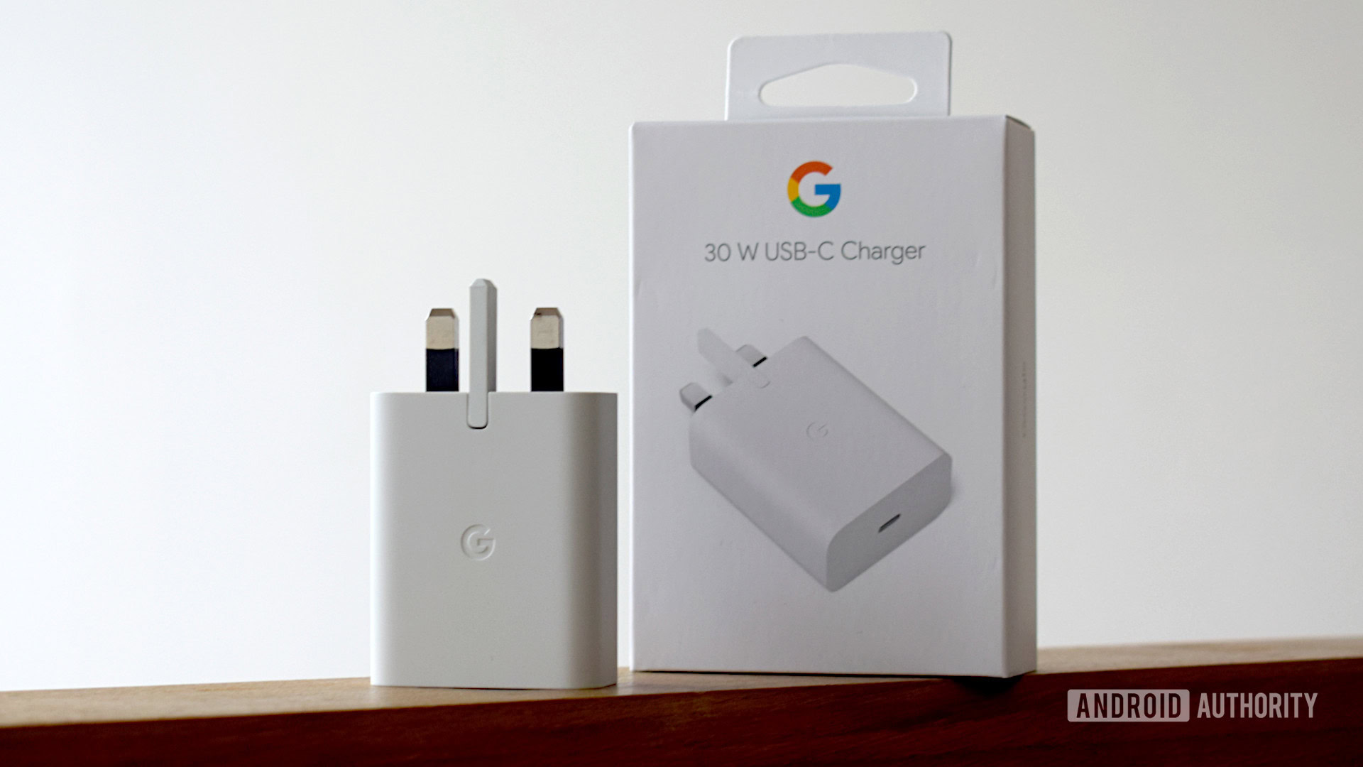 Google 30W USB C Power Charger box Google 30W USB C Power Charger upright next to box
