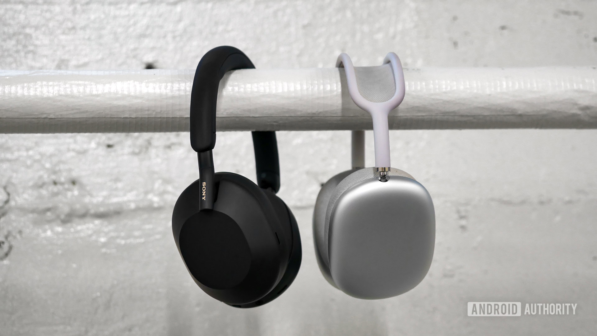 sony wh-1000xm5 vs apple airpods max The Sony WH-1000xm5 next to the Apple AirPods Max.