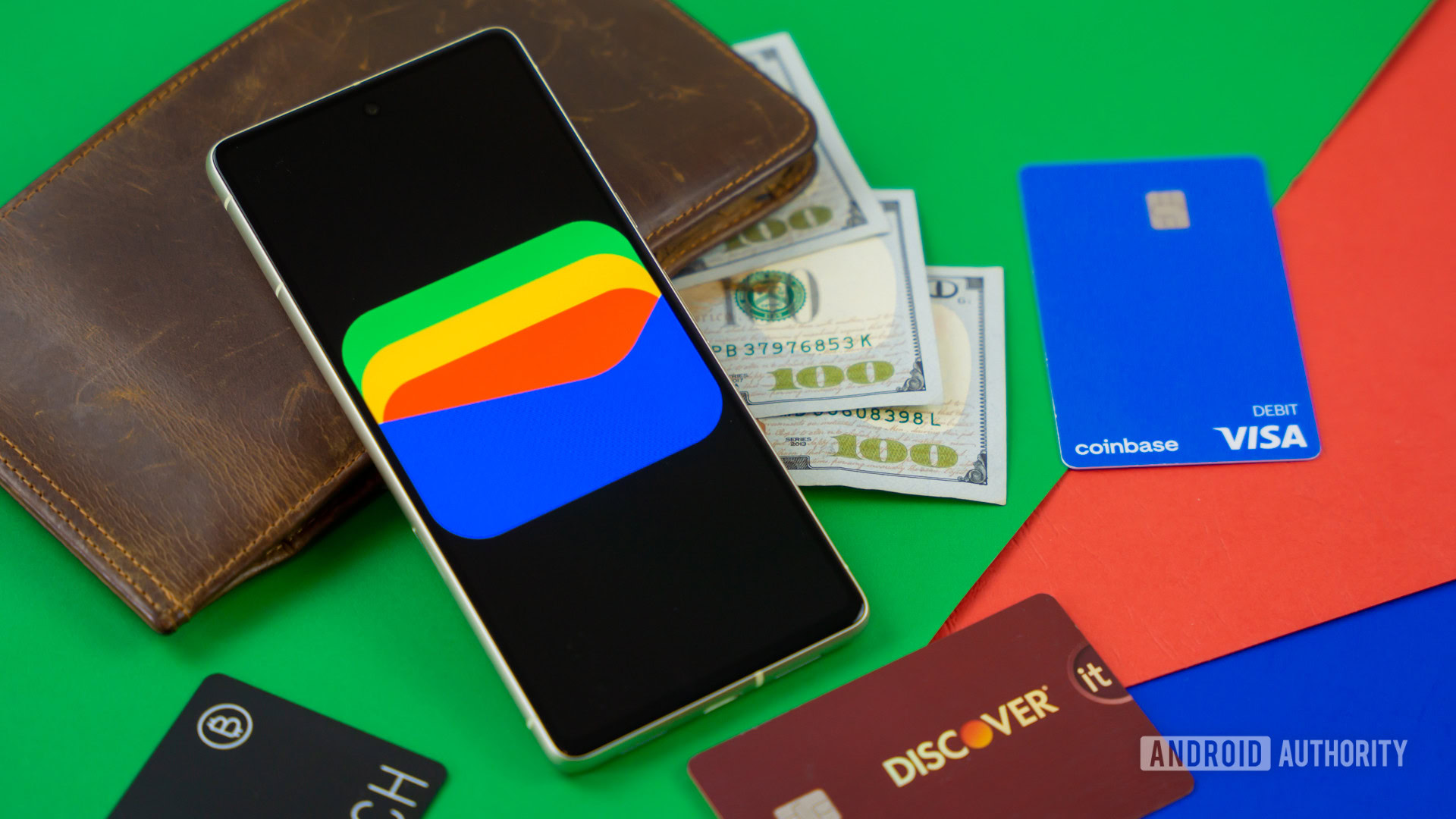 Google Wallet logo on smartphone next to credit cards and cash Stock photo 4 Google Wallet logo on smartphone next to credit cards and cash Stock photo 4