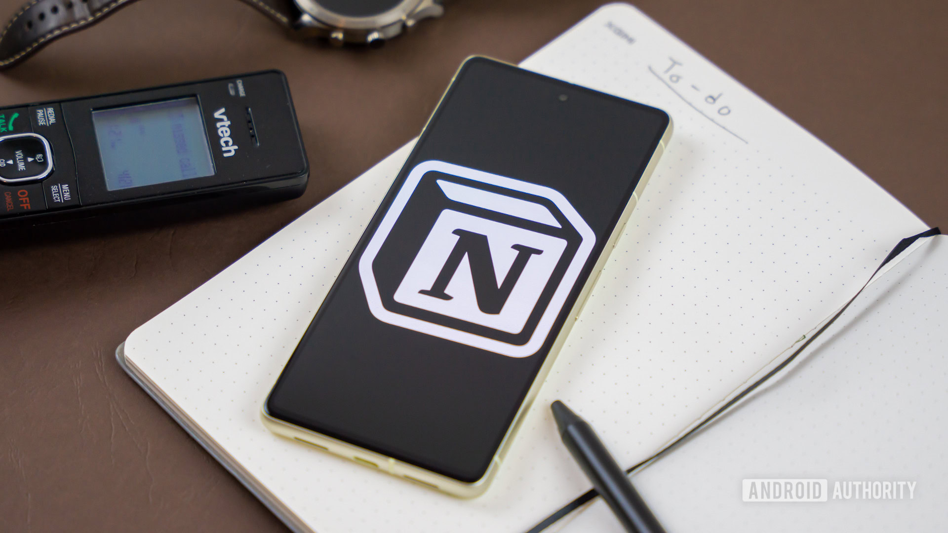 Notion logo on snartphone next to other office products Stock photo 2 Notion logo on snartphone next to other office products Stock photo 2