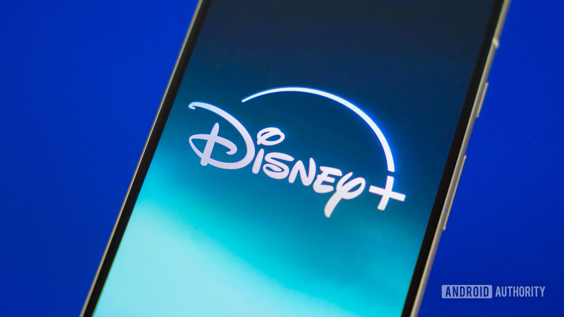 Disney Plus logo on smartphone stock photo (2) Disney Plus logo on smartphone stock photo (2)