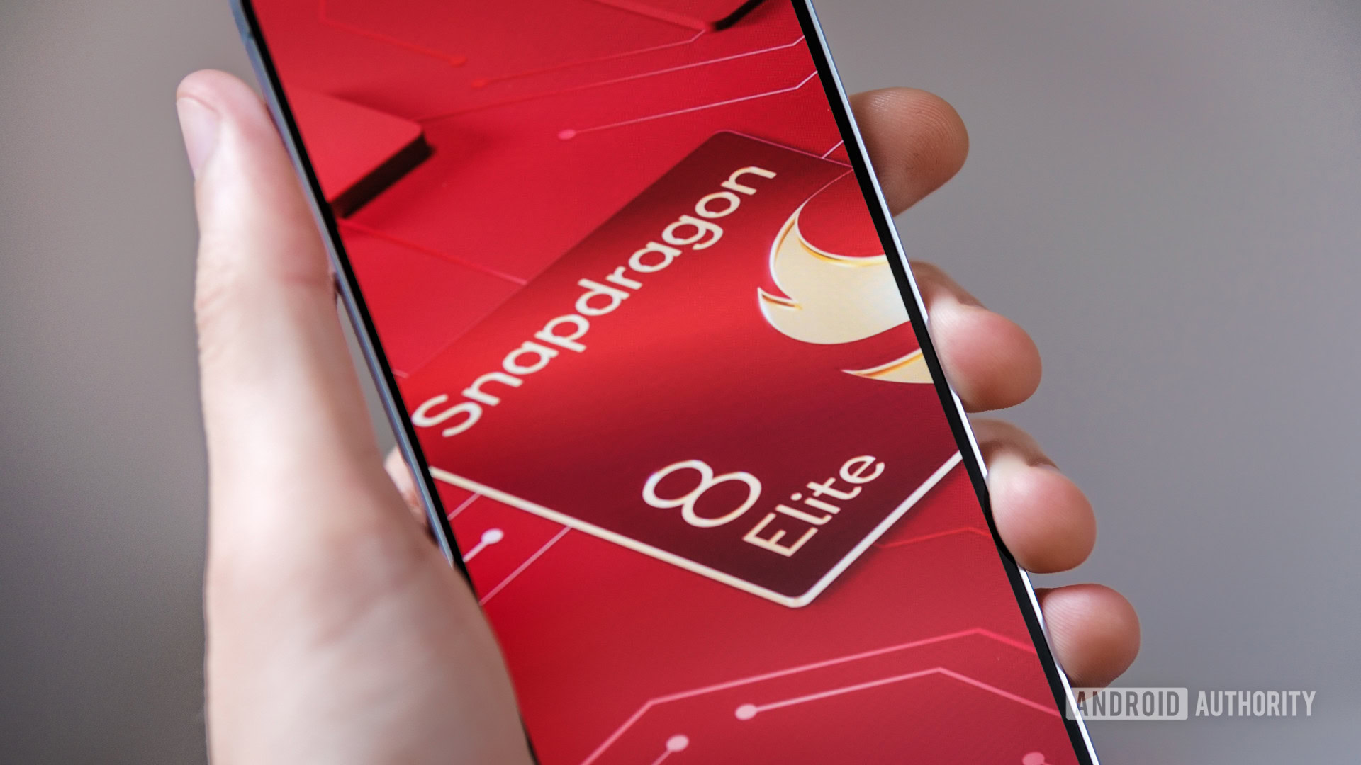 Snapdragon 8 Elite logo in hand Snapdragon 8 Elite logo in hand
